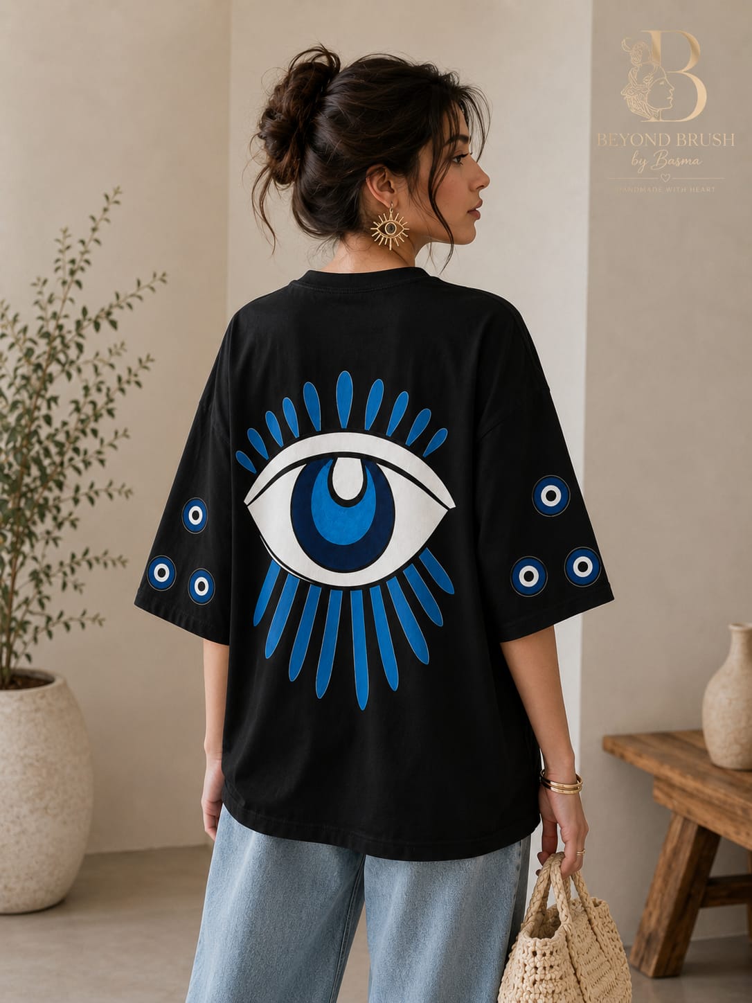 Oversized T-shirt with evil eyes