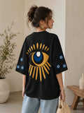Oversized T-shirt with evil eyes