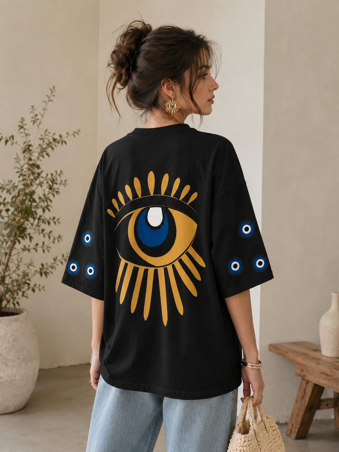 Oversized T-shirt with evil eyes